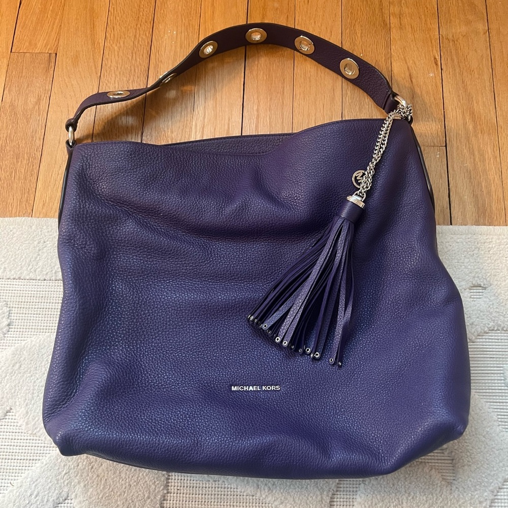 Michael Kors — Grape Leather Bag w/ grommet detailing and silver hardware